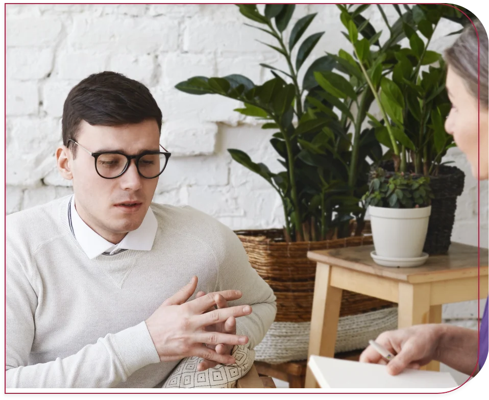 A coach in conversation with a client